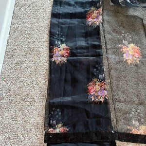 Black saree with work for sale.
